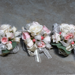 pinky peach pearl wrist corsages   photo by Henry Ninde Photography