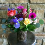 vibrant spring in a hickory vase