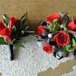 custom red spray rose corsage $39.95  matching boutonniere $12.95