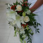 White lily red rose and white orchid cascade bridal bouquet